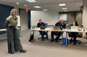 Tammy Franks outlines a plan for building new curriculum during a meeting of the Board in Itasca, IL.