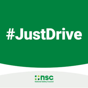 This is a drive distraction-free safety sign from the National Safety Council. The message: Just Drive.
